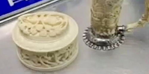 长沙海关查获象牙制品1047克,为3件乳白色工艺品摆件